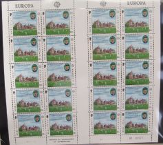 GB stamps and regions: red stock book and folder of mostly unmounted mint sets to £1 with blocks,