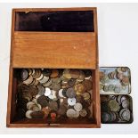 A large accumulation of world coins of various grades and denominations