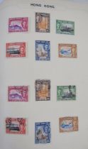 British Empire stamps: green Simplex A - Z album of mint & used QV-QEII issues with sets and