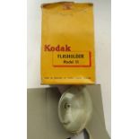 Collection of camera flash and other related items, including Kodak Flasholder model II, Kodalite