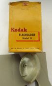 Collection of camera flash and other related items, including Kodak Flasholder model II, Kodalite