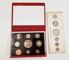 2002 UK proof set red leatherette casing, 1967 Canadian year set with one dollar note.