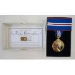 Queen Elizabeth II golden jubilee medal 1952-2002, in box of issue with certificate of