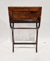 Late 19th century mahogany folding campaign writing table opening to reveal a gilt tooled leather