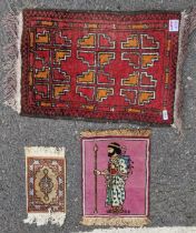 Middle Eastern silk miniature prayer rug and two wool examples, one with geometric medallions on a