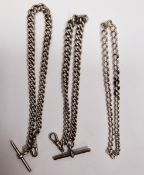 Two silver graduated albert chains with T-bars, 89.7g approx., and another length of graduated