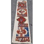 North-West Persian kilim runner, on cotton backing, woven with hexagonal medallions within geometric