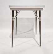 Vintage foldover work table/artist's table with rotating white formica coated top, on four metal