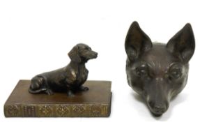 Cast iron doorstop in the form of a fox head, probably late 19th century, 16.5cm long and a bronze-
