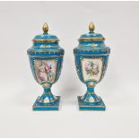 Pair of late 19th century Sevres-style turquoise ground vases and covers, each with pine cone