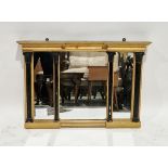 Regency giltwood overmantel mirror, of canted rectangular triparte form, the moulded cornice above