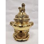 Large 20th century Chinese bronze and gilt metal censer, cover and stand, with beast handles, raised