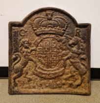 Large cast iron fireback depicting coat of arms of Charles I, measuring approx. 56cm high x 53cm