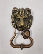 19th century brass lion mask door knocker, with fittings, approx. 22cm high overall