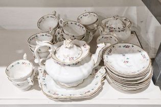 English porcelain part tea service, circa 1835, painted with sprigs of flowers and leafy tendrils