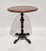 20th century cast-iron based pub style table of circular form with mahogany top having four lion's