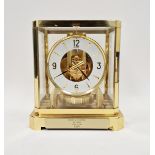 1970’s/80’s Jaeger Le Coultre Atmos mantel clock, the circular dial having alternating gilt Arabic