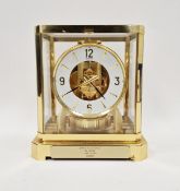 1970’s/80’s Jaeger Le Coultre Atmos mantel clock, the circular dial having alternating gilt Arabic
