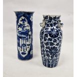 Two Chinese Qing dynasty blue and white vases, the first of sleeve form painted with precious