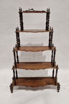 Victorian five-tier waterfall whatnot, each tier raised on barleytwist front supports, 130cm high