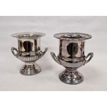 Two 20th century silver-plated urn-shaped champagne coolers, one with label for 'Ranleigh', each