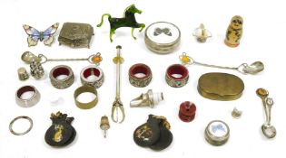 Assorted collectables including four white metal napkin rings, a silver-plated reeded example