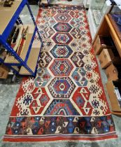 Caucasian kilim runner or gallery carpet, decorated with hexagonal medallions in red, blue,