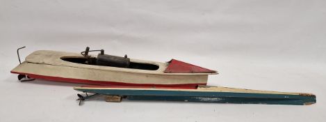 Two mid-century pond yachts, the first painted in white and red, with remnants of old motor, 65.