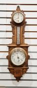 Early 20th century oak-cased aneroid barometer/thermometer with carved foliate motifs throughout the