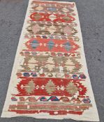 North-West Persian/Caucasian kilim runner woven with geometric bands in red, blue, purple and