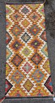 Chobi kilim runner, woven with geometric borders in yellow, blue, red and black, on a cream