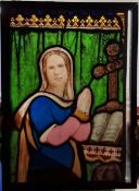 Victorian framed stained glass panel of the Virgin in prayer, within ebonised frame, 46.5cm x 64.5cm