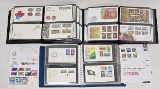 GB Guernsey: Box of 2 high quality Leuchtturm albums plus a blue album and packet mostly full of