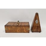 20th century French metronome by Maelzel Paquet, 23cm high, and a late Victorian brass-bound oak