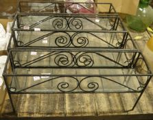 Four metal garden plant holders, 41cm high (4)