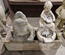 Two reconstituted stone garden water features, one as a frog, 36cm, the other cross-legged child