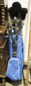 Set of golf clubs within carry bag, the clubs are marked 'Wilson'  Condition Report Additional
