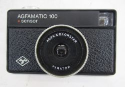Extensive collection of cameras and related accessories, to include a Agfamatic 100, Kodak