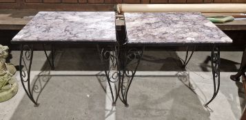 Pair of pink veined marble topped garden tables on black painted iron bases, 57cm x 46cm x 53cm