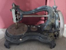 Antique cast iron table top hand crank  sewing machine by Jones