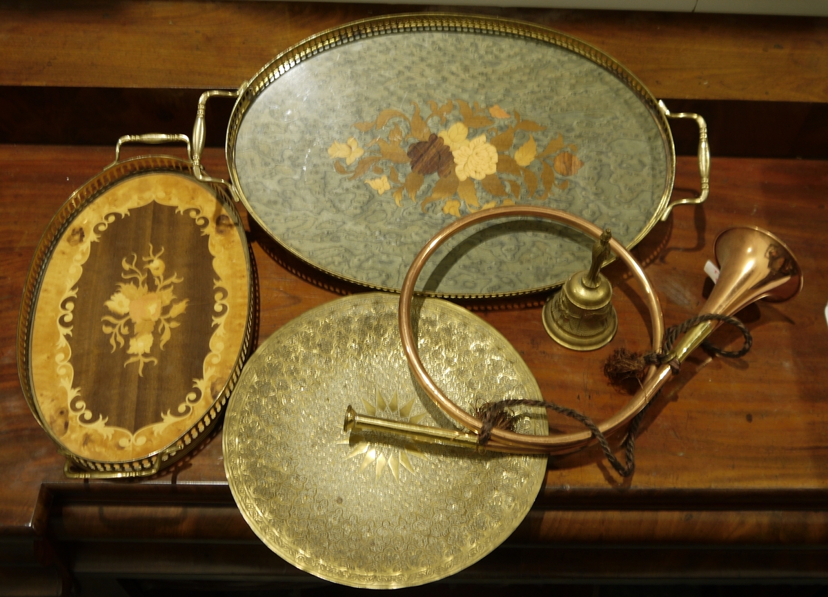 Assorted brass-coloured trays with painted bases and galleried edges, a copper reproduction post