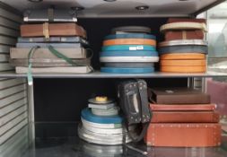 Quantity of empty assorted film carry cases/ storage boxes of varying size , shape and material
