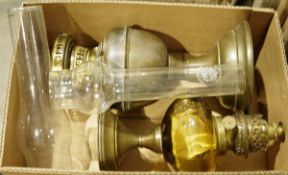 Two brass companion sets and two paraffin lamps with chimneys (1 box plus)