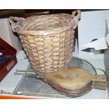 Brass-coloured folding spark guard, a pair of wooden bellows and a log basket (3)