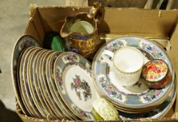 Late Victorian dessert service with cake stand, dessert plates, central floral decoration with green