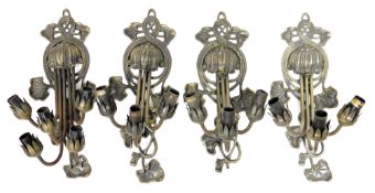 Collection of 20th century Art Nouveau-style floral wall lights, cast with bronzed metal whiplash