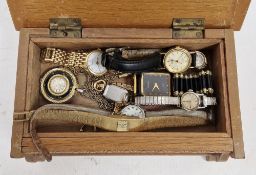 Quantity of lady's watches held within a Bulova miniature musical jewel box in the form of a coffer
