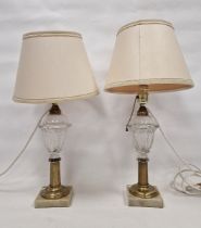 Pair of vintage 20th century gilt metal glass-mounted table lamps, each with leaf moulded glass