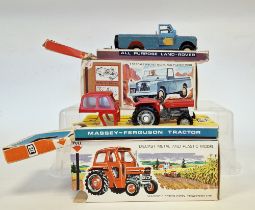Two boxed Britains farming diecast models to include 135 Massey Ferguson tractor and 9676 Land Rover