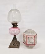 Late Victorian oil lamp with acid-etched shade, decorated with convolvulus and leaves, above gilt-